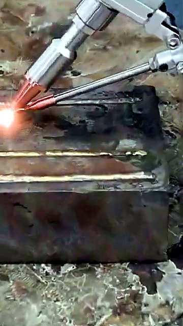 Handheld torch + wire feed on block (SKU ask)
