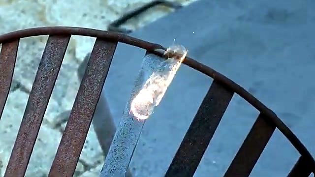Handheld Dedicated torch on rusted Boma basket (SKU ask)