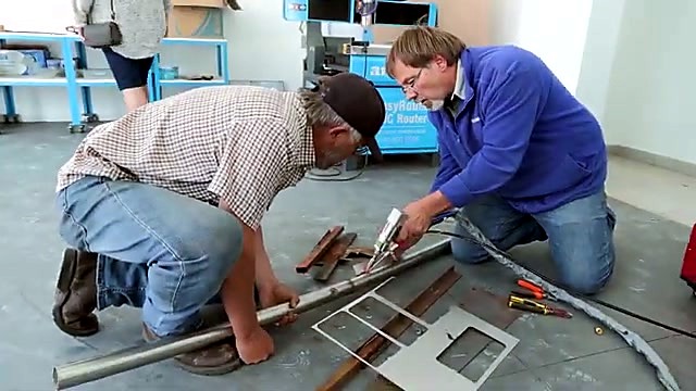 Torch welding plate onto stainless tube (wattage open)
