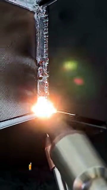Handheld torch welding metal with bright flash (SKU ask)