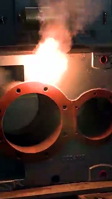 Handheld RustOff head bright spark on cast engine block (SKU ask)