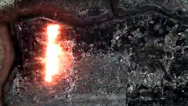 CLEAR laser beam stripping black coating from pavers (SKU ask)