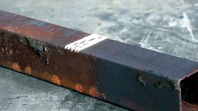 Handheld RustOff cleaning rusted metal bar (SKU ask)