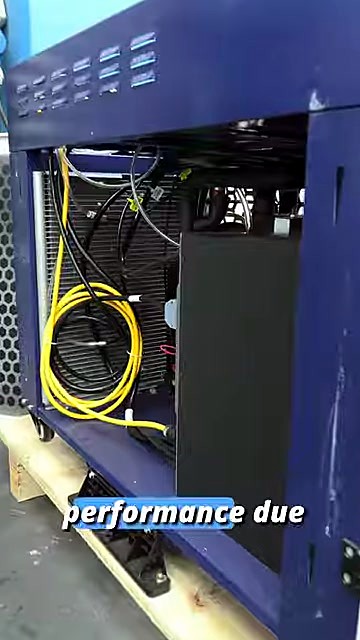 Open cabinet — yellow fibre coil + cooling lines (SKU ask)