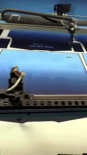Mid-cut working view over printed media (SKU ask)