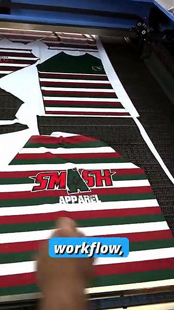SMASH APPAREL cut jersey panels on conveyor (SKU ask)
