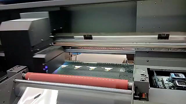 Built-in laminator roller and film path