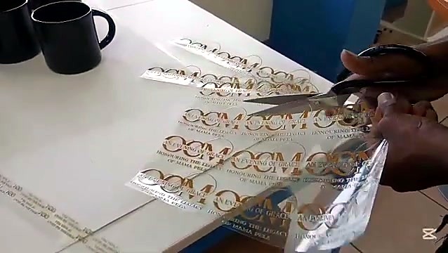 Hands cut gold circular UV-DTF decals (SKU ask)