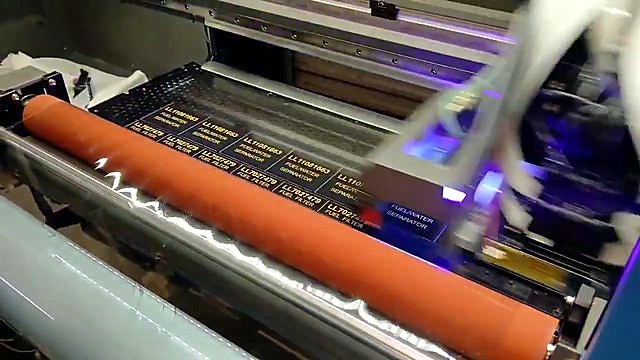 Multi-row industrial UV-DTF labels mid-print (SKU ask)