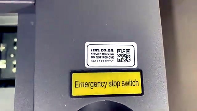 am.co.za SERVICE TRACKING sticker above Emergency stop (SKU ask)