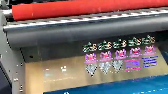 Colorful sticker rows under red roller (SKU ask)