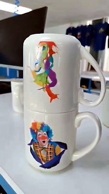 Printed mugs on workshop table (SKU ask)