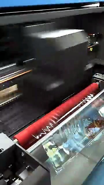 Red roller + printed film exit path (SKU ask)