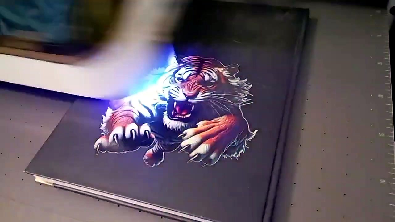 Nearly complete tiger on notebook cover (SKU ask)