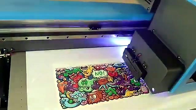 UV LED curing pass over the doodle print on the flatbed