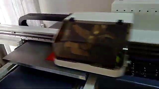 White UV carriage mid pass on flat bed (SKU ask)
