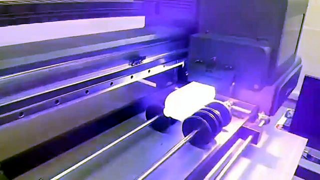 Rotary rollers + UV cure printing white bottle (SKU ask)