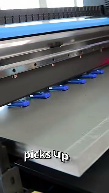 Loading row of blue USBs on grey flatbed (SKU ask)