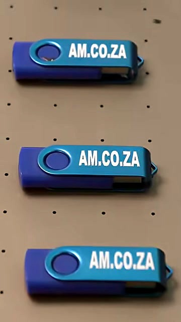 Finished AM.CO.ZA logos on blue USBs (SKU ask)