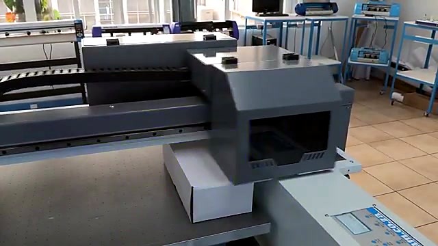 Carriage UV pass over white cardboard box (SKU ask)