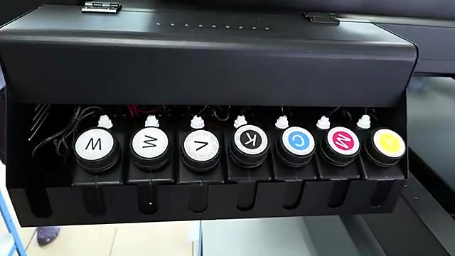 WWVKCMY ink tank caps under open cover (SKU ask)
