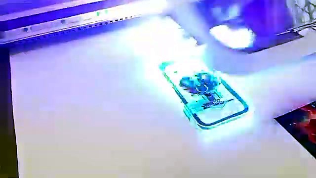 UV blue cure over phone case on bed (SKU ask)