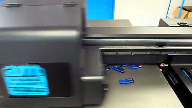 UV cure carriage printing over blue USB batch (SKU ask)