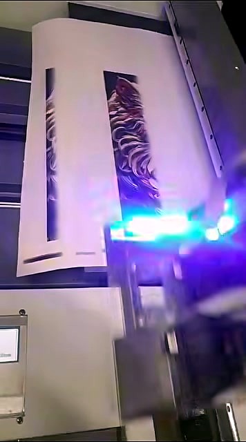 Blue UV cure glow at carriage over white media (SKU ask)