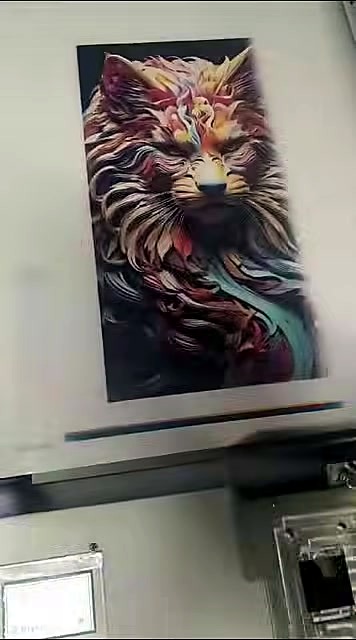 Completed lion print + CMYK bar on media (SKU ask)