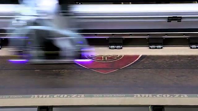 Purple UV cure under carriage over Arsenal print (SKU ask)