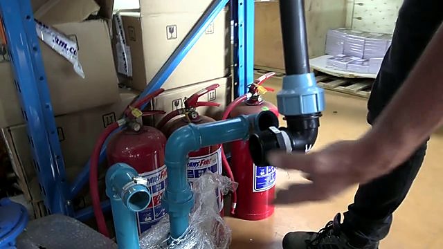 Blue/black HDPE pipe unions in warehouse (SKU ask)
