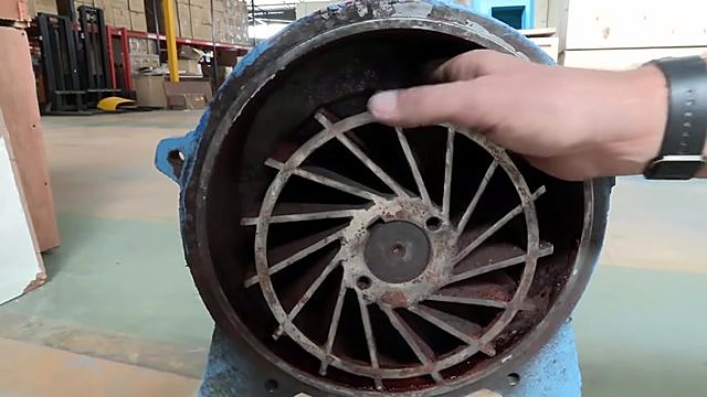 Curved metal impeller blades inside pump housing (SKU ask)
