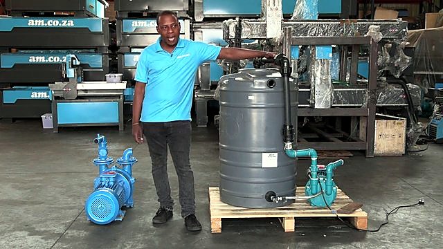 Liquid-ring vacuum setup — grey ribbed tank + blue & teal pumps (SKU ask)