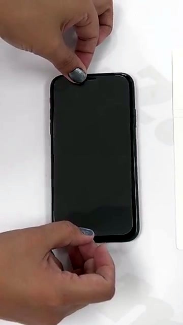 Apply clear film protector to phone screen (SKU ask)