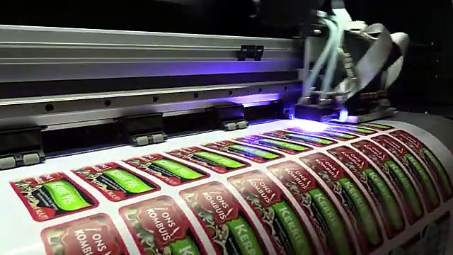 UV carriage over rows of Kerrievis labels (SKU ask)