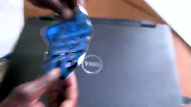 Applying cut am sticker to laptop lid (SKU ask)