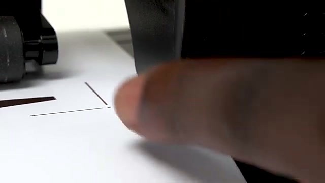 Finger points L-reg mark under carriage for contour (SKU ask)