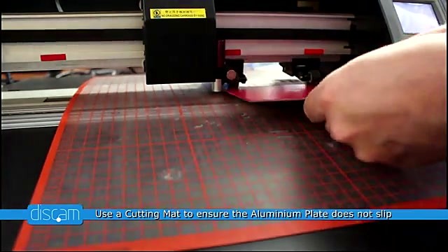 Red aluminum plate on cutting mat in V-Smart (SKU ask)