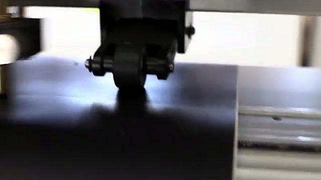 Pinch rollers cutting black vinyl (SKU ask)