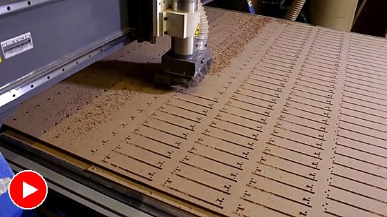 Spindle cutting wood on T-slot