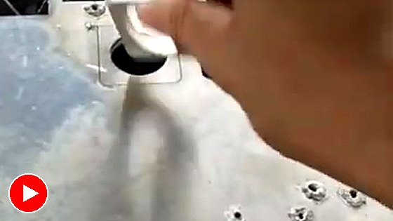Hands remove aluminium cut-outs